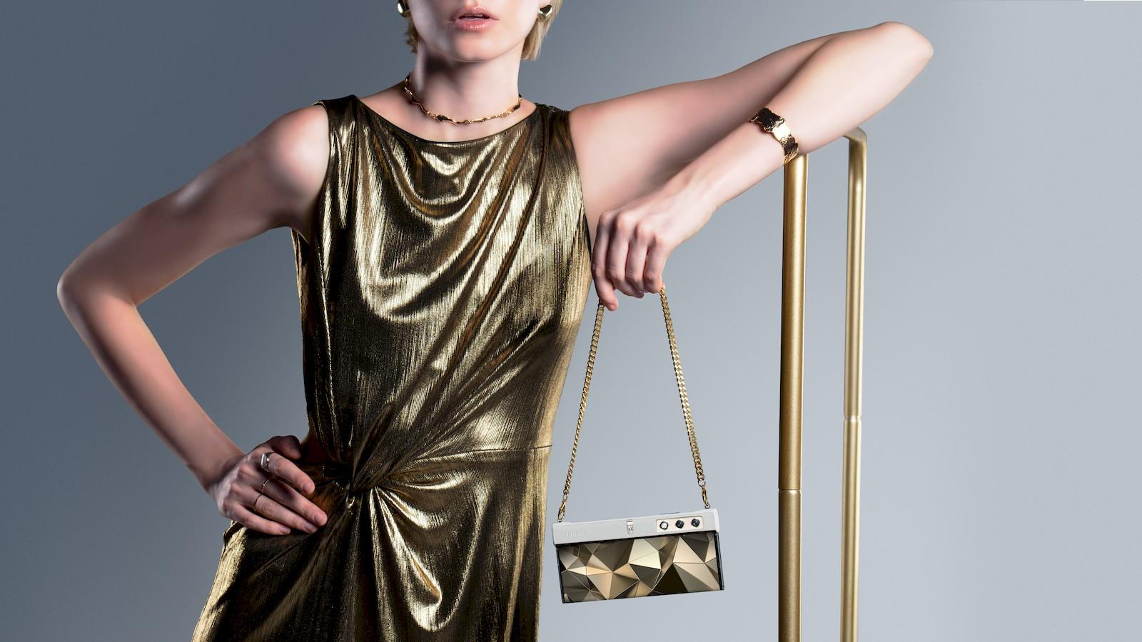 Honor V Purse is a foldable smartphone that can be carried as a purse